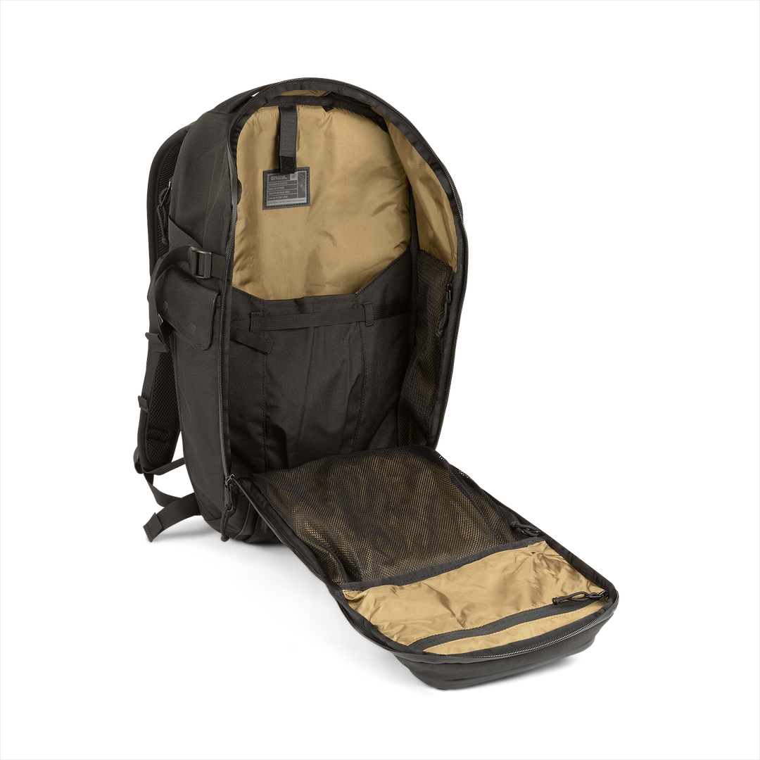 20L Mission Daypack (Covert Black) with open compartment showing Coyote interior on a white background / Covert Black