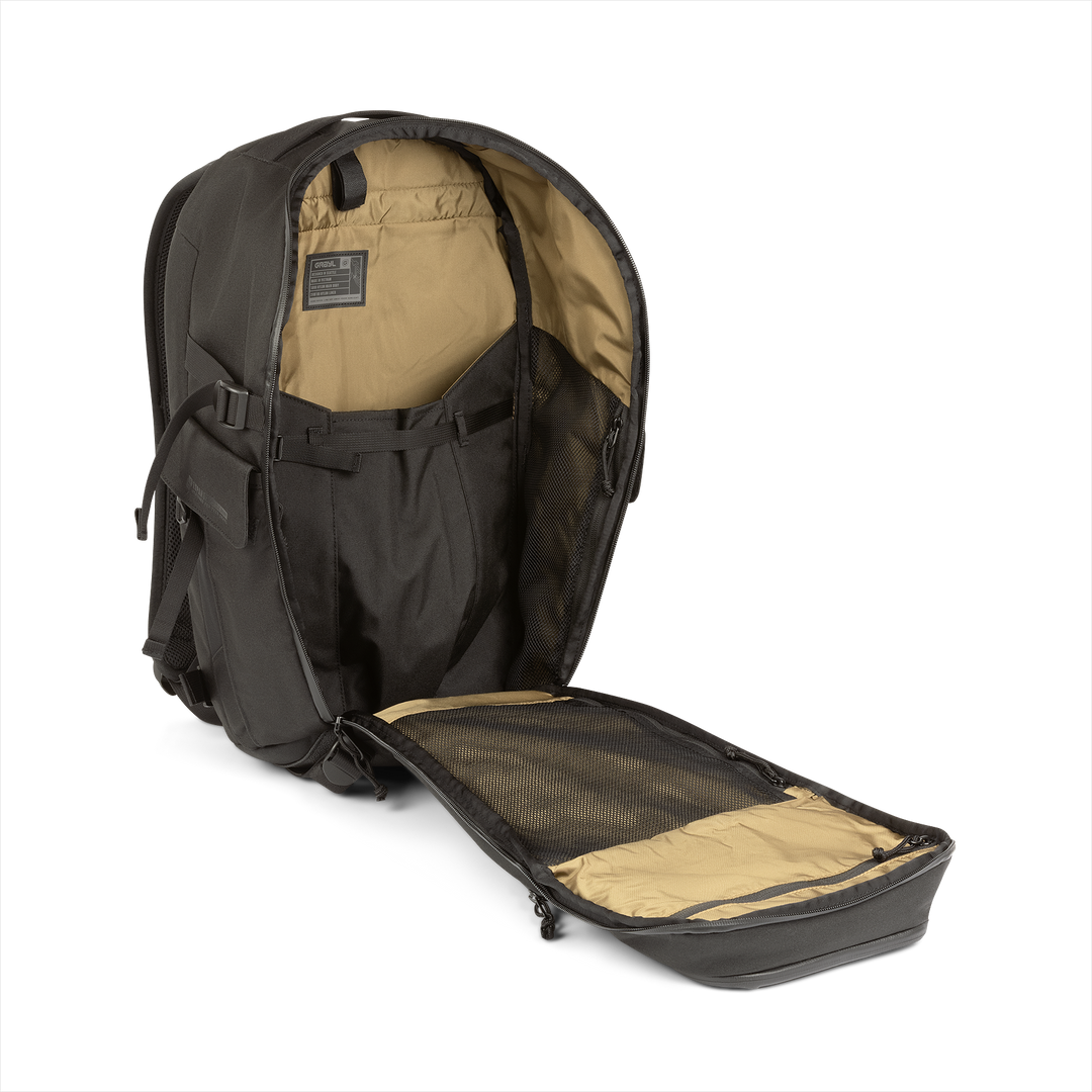 20L Transport Backpack (Covert Black) with open compartment showing Coyote interior on a white background / Covert Black