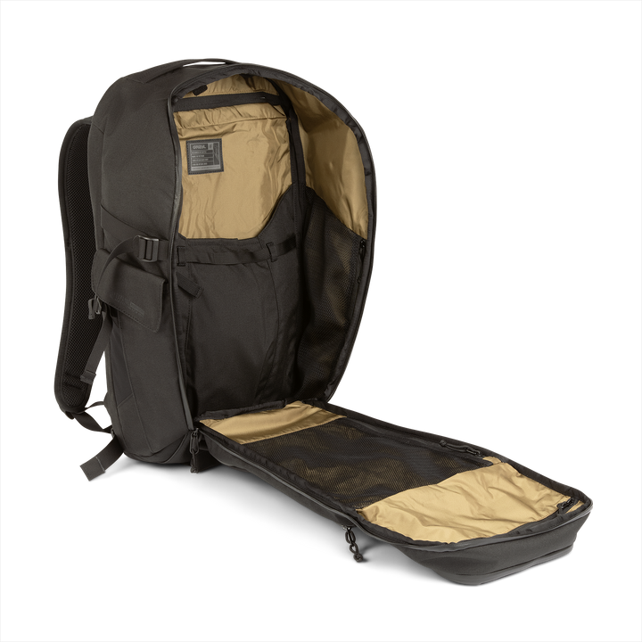 30L Transport Backpack (Covert Black) with open compartment showing Coyote interior on a white background / Covert Black
