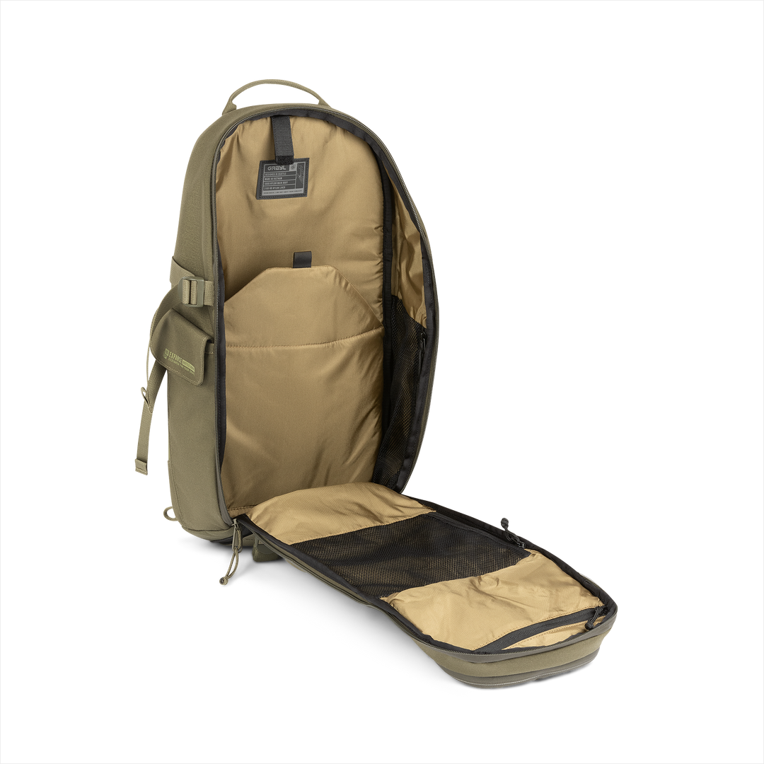 18L Transport Sling Daypack (Olive Drab) with open compartment showing Coyote interior on a white background / Olive Drab