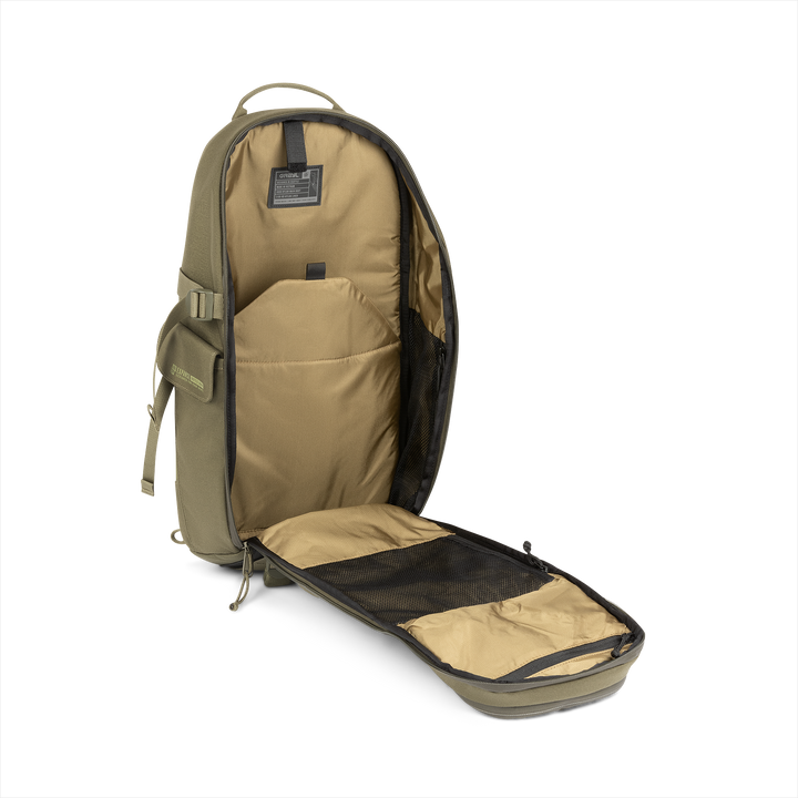 18L Transport Sling Daypack (Olive Drab) with open compartment showing Coyote interior on a white background / Olive Drab