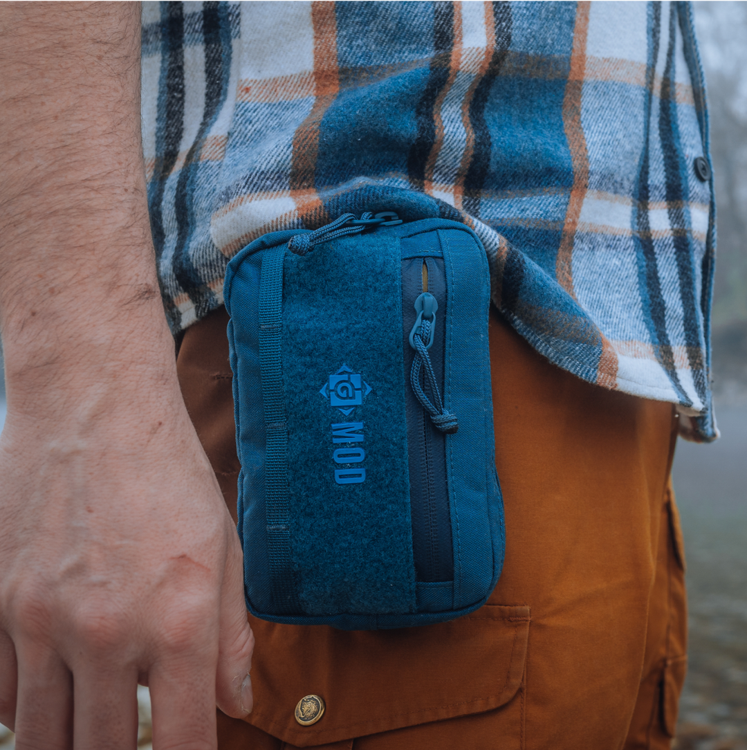 G-MOD Flat Wallet Pouch in Wander Blue worn as a belt attached to hiker's belt.