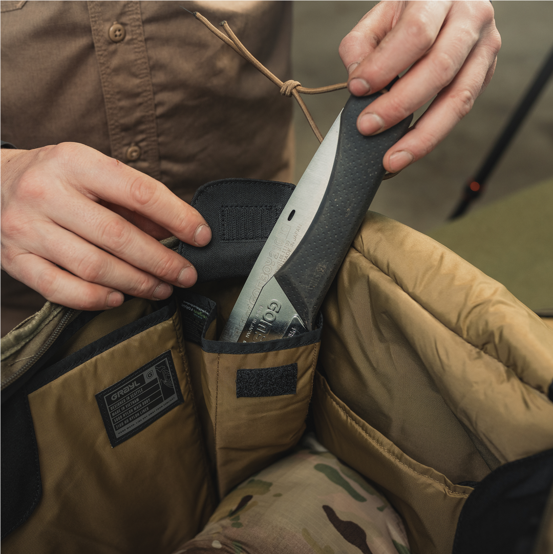 Internal 3D bottle and accessory pockets.