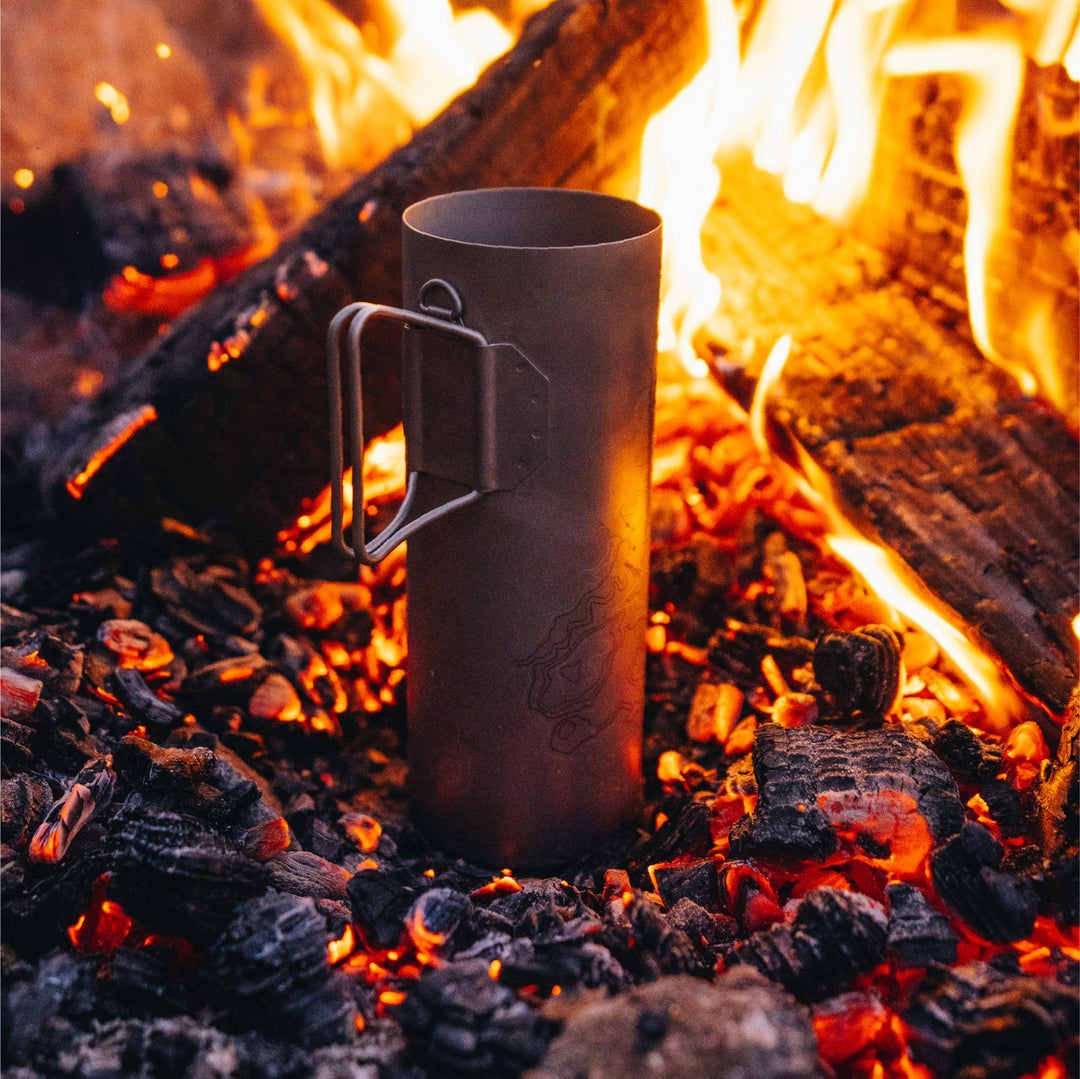 Chauffer sur un feu.